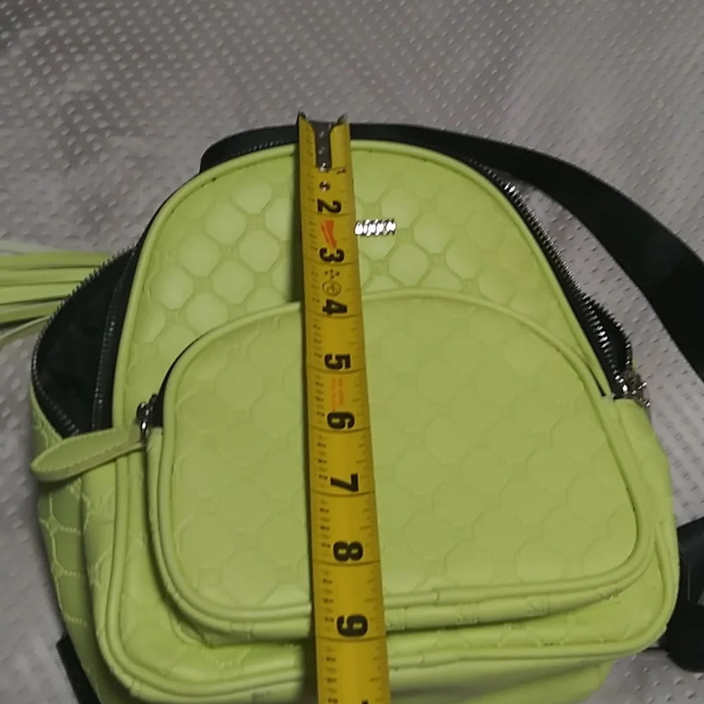 Steve madden neon backpack.